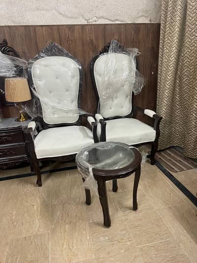 2 chairs with coffee table