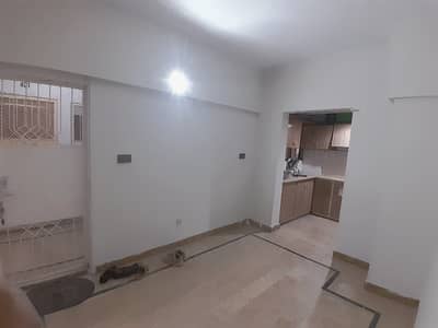 FLAT FOR SALE GULISTAN-E-JAUHAR BLOCK 14 MAIN MUNAWAR CHOWRANGI.