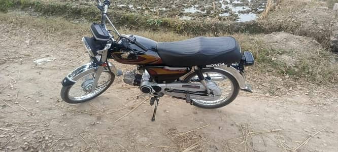 Honda CD 70 2012 model Sialkot number 03 27 35 83 3 69 my WhatsApp