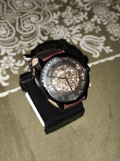 orgnaill fossil watch use  bilkul nai hoi pit of country sy AI Hai