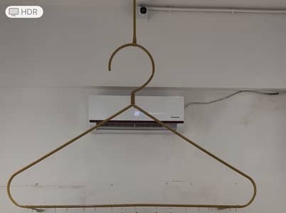 Hanger with wall fitting