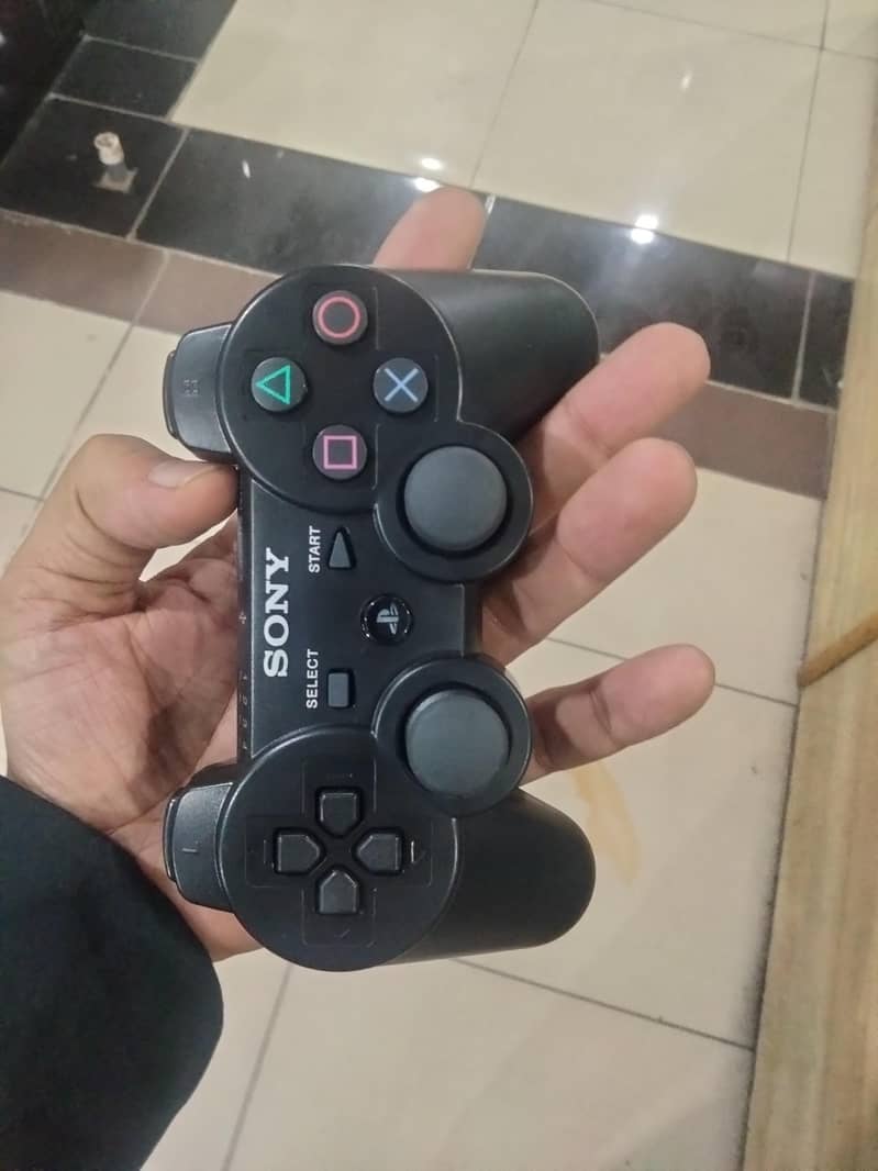 PS3 with 2 controller 1