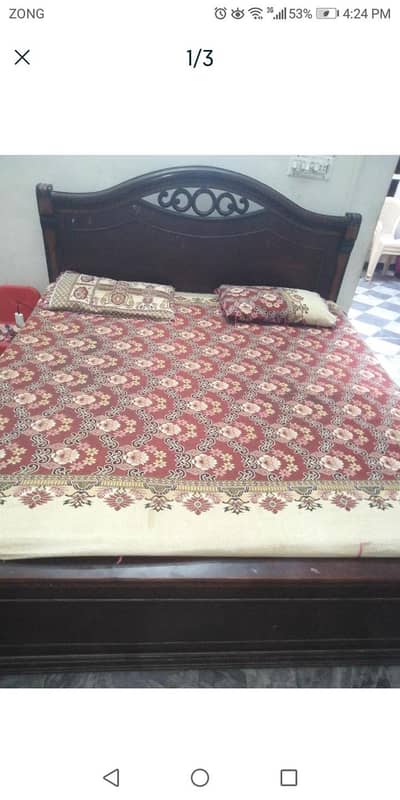 wooden bed in used but good condition