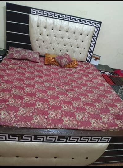 bed with dressing table and side tables