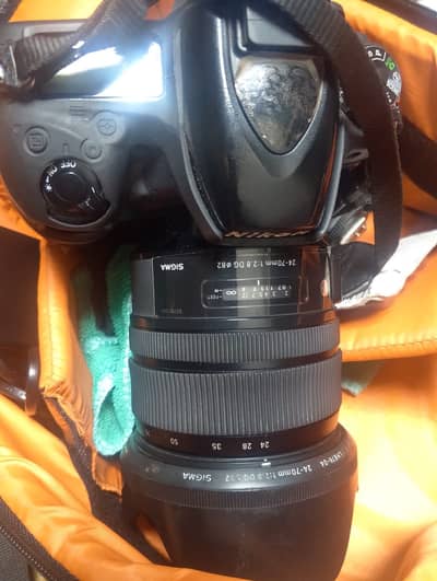 Camera 750 Lenz 24 70 fore sale