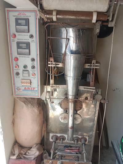 Packing machine for ( Salt, sugar, surf, Rice,etc ). 500 gms_1000 gms