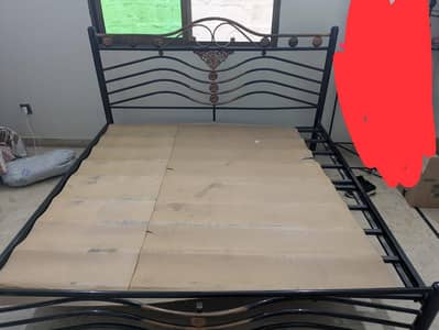 Iron bed with mattress