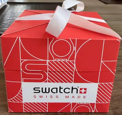 swatch +omega swiss made