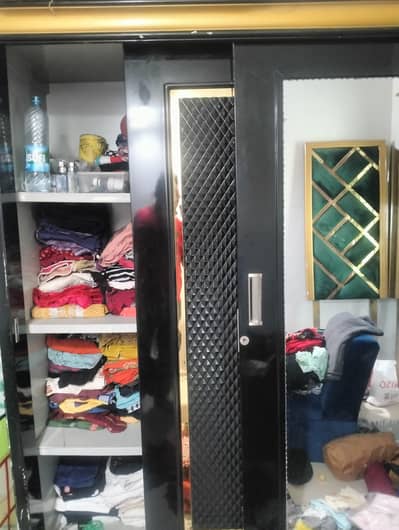 Big Size Wardrobe In Stylish shape with sliding doors and mirror