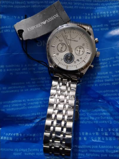 3 wachts Hain bernd ki hain orngl 2 EMPORIO ARMANI ki hain 1 swiss ki