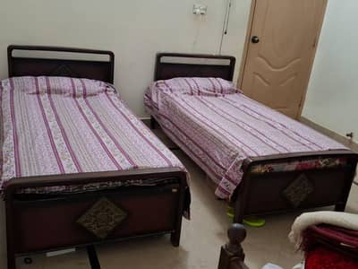 Sharing Rooms in Girl's Hostel in Gulistan-e-Jauhar