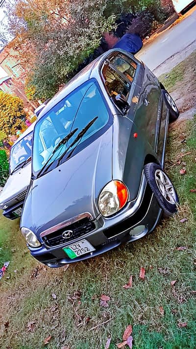 Hyundai santro 05 mdl. almost genuine. Rims,power steering. AC,lush cond