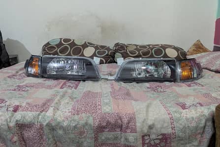 Indus Corolla smoked head lights