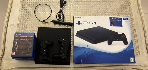 PS4 Slim | 1TB Non jailbreak | 2 Controllers | PS Camera | 7 Games