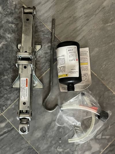 Car jack and puncture kit