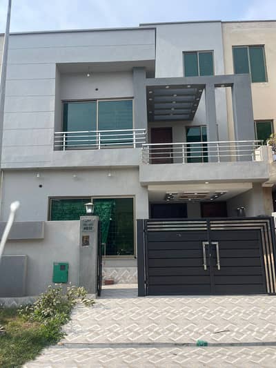 5 Marla Brand New House For Sale In Sector D Bahria Town Lahore