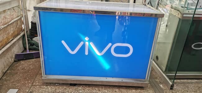 mobile counter lighting Wala oper Wala glass tota ha lakin or sub teak