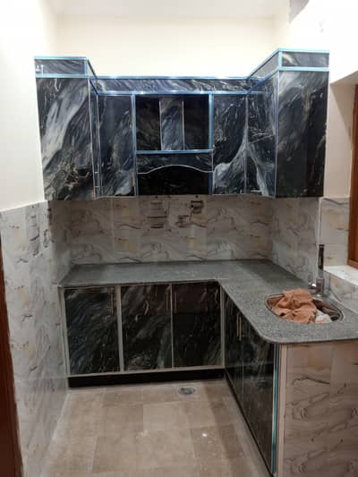 2 Marla Double story Flat For Sale Demand 60 lack 4 Bedroom 2 bathroom 2 kitchen TV Long Car Porch Electricity water Rent value 40000 Tahir Khan 03115850472