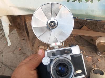 Tripod with Olympus camera