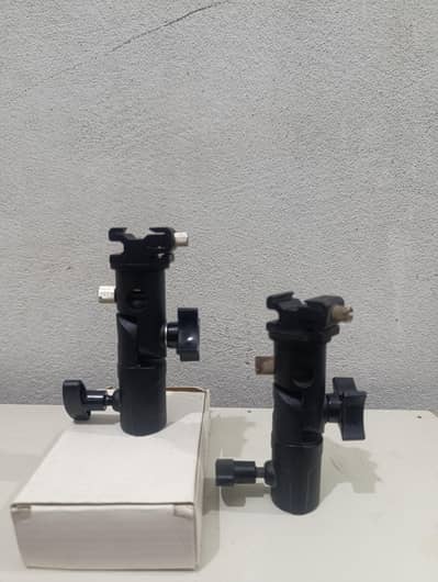 Shoe mount bracket umbrella