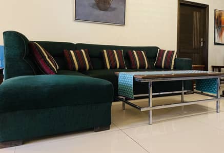 L-shaped sofa with centre table