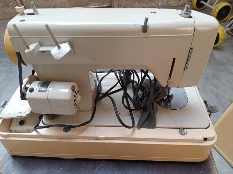 sewing machine 15