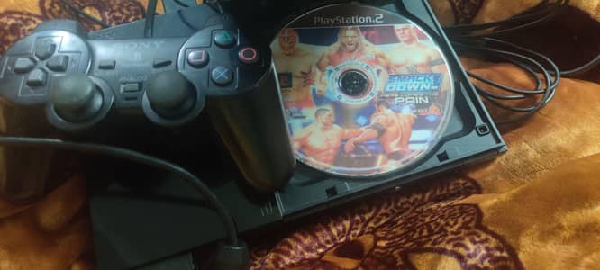 ps2 slim edition with 1 original controller