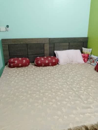 wooden bed set for sale (2 single bed combined good condition)