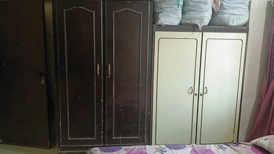 TWO wooden wardrobes