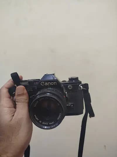 AE1 camera  with  lens Fd 100 300 mm