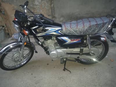 Honda 125 black colour 10 bay condition documents complete