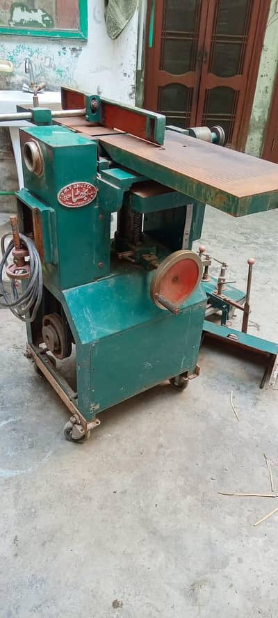 all-in-one woodworking machine, or combination machine,