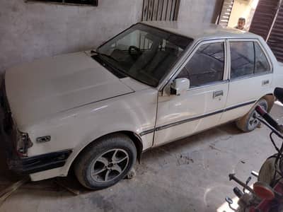 Nissan 1.0 model 1986 power steering cplc clear,allow rim tyre good