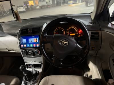 Gli 2013 silver toyota corolla