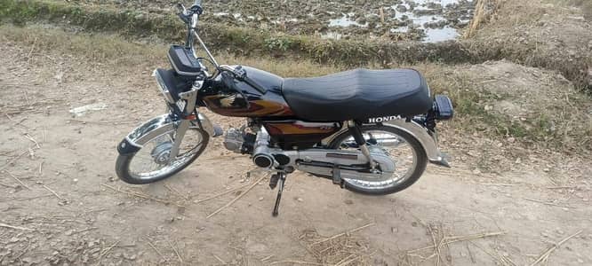 Honda CD 70 2012 model Sialkot number 03 27 35 83 3 69 my WhatsApp