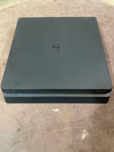 PlayStation 4 Slim 500 GB with 3 Games.
