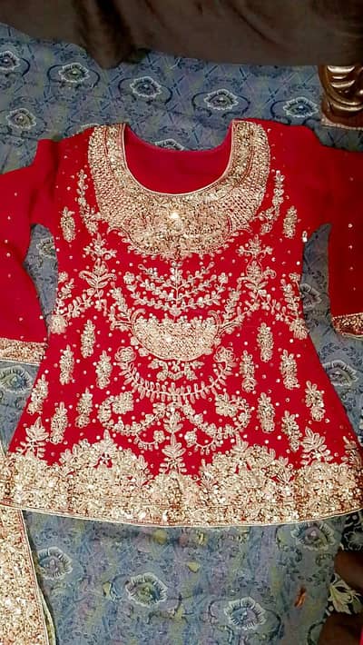 Bridal Red coloured fancy Lehnga