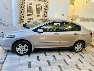 Honda City bumper to bumper Janeman just like a brand new car