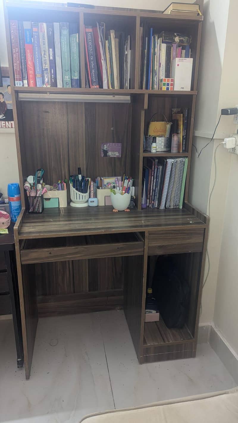 Brown colored spacious table 0