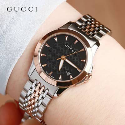 Gucci women’s swiss made quartz black dial 27mm Watch - YA126512