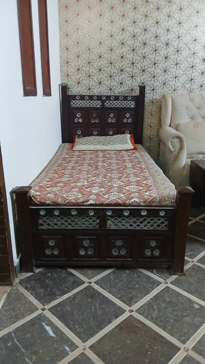 Pure wood single bed for sale urgently condition is good