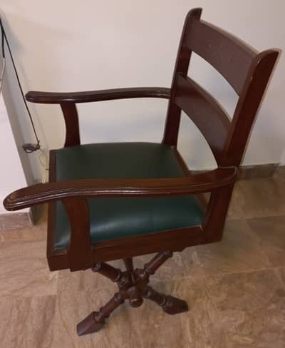 A pair of wooden chairs, old style. Single TV lounge chair
