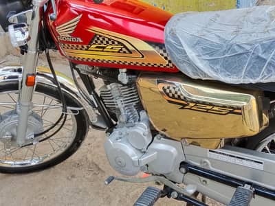 Honda 125 argantsaling first onar Karachi nombar plate