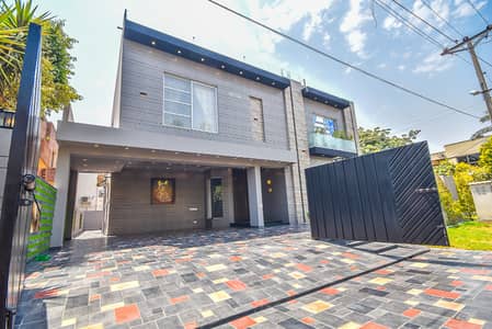 22 Marla Corner Modern Design Most Beautiful Full Basement 7-Bedroom 3-Kitchen Facing Park Bungalow For Sale At Prime Location Of DHA Lahore Near To Park Masjid & Gold Crest Mall.