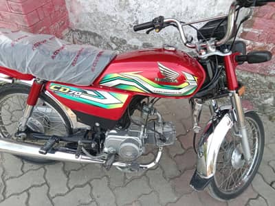 A Honda 70 2023 model bike for sale all Punjab number lush condition