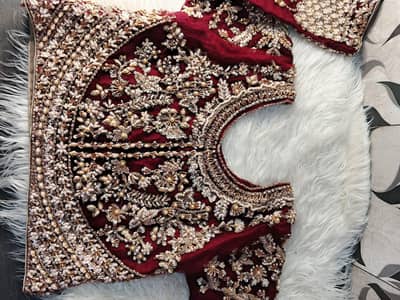 Elegant Maroon Bridal Dress – Heavy Hand Embellished (Used Once)