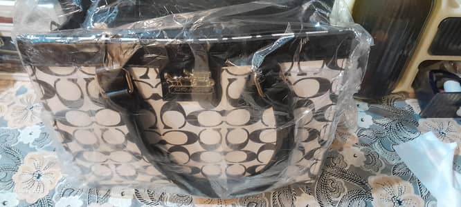 hand bag brand coach