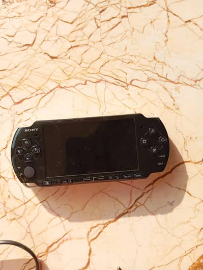 PSP with charger and box