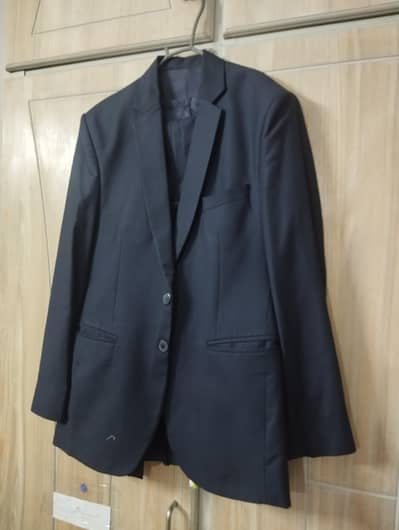 three piece suit in navy blue colour
