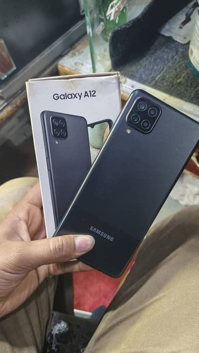 samsung a12 with box 4/64 pta approved
